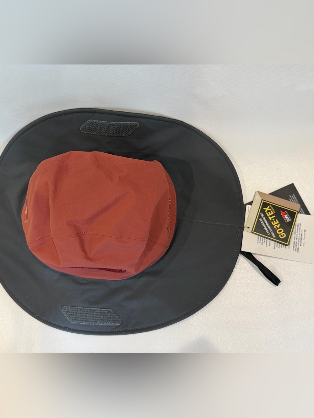 Outdoor Research Gore-Tex Bucket Hat in Rust Red and Charcoal